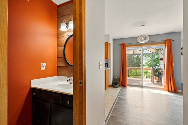 1255 Pacific St, Ely, IA 52227 - bathroom with vanity and wood finished floors