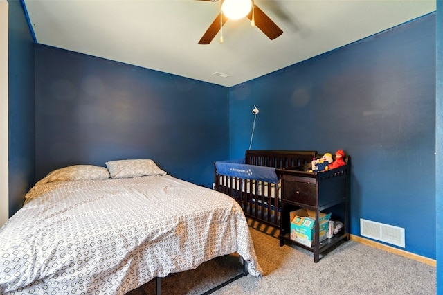 1255 Pacific St, Ely, IA 52227 - bedroom with carpet and ceiling fan