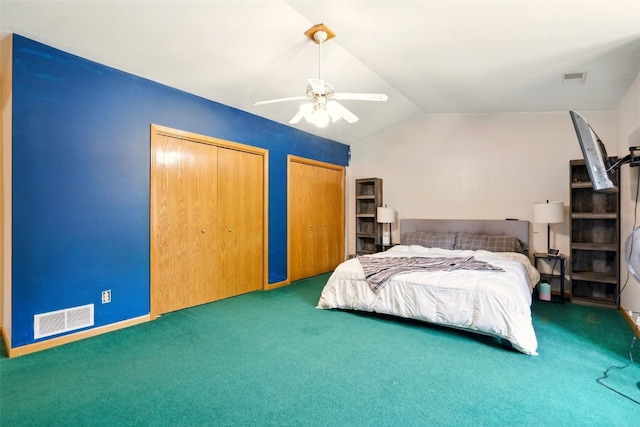 1255 Pacific St, Ely, IA 52227 - bedroom with carpet floors, two closets, vaulted ceiling, and a ceiling fan