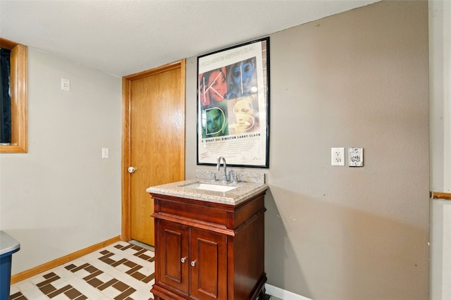 1255 Pacific St, Ely, IA 52227 - bathroom with vanity and tile patterned floors