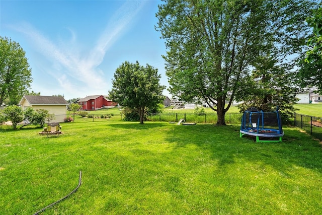 1255 Pacific St, Ely, IA 52227 - view of yard with a trampoline