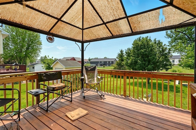 1255 Pacific St, Ely, IA 52227 - wooden deck featuring a yard and a residential view