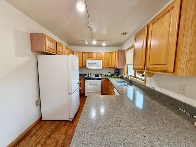 2208 Holiday Rd, Coralville, IA 52241 - kitchen with white appliances and stone countertops