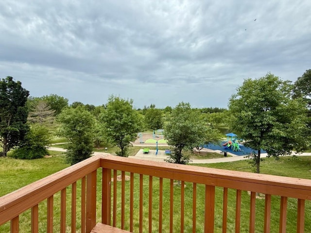 2208 Holiday Rd, Coralville, IA 52241 - deck featuring a yard