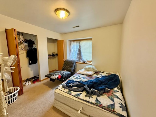2208 Holiday Rd, Coralville, IA 52241 - bedroom with carpet flooring