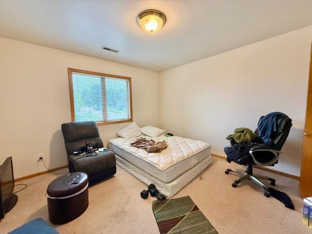 2208 Holiday Rd, Coralville, IA 52241 - bedroom with carpet flooring and baseboards