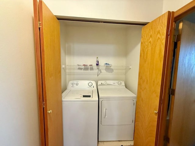 2208 Holiday Rd, Coralville, IA 52241 - laundry area featuring separate washer and dryer