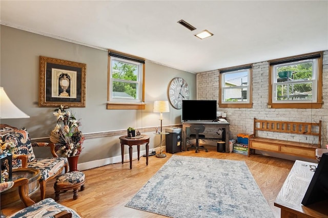 433 Cherry Hill Rd NW, Cedar Rapids, IA 52405 - living area with healthy amount of natural light and wood finished floors