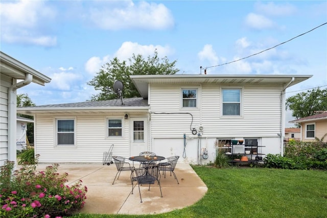 433 Cherry Hill Rd NW, Cedar Rapids, IA 52405 - rear view of house with a yard and a patio area