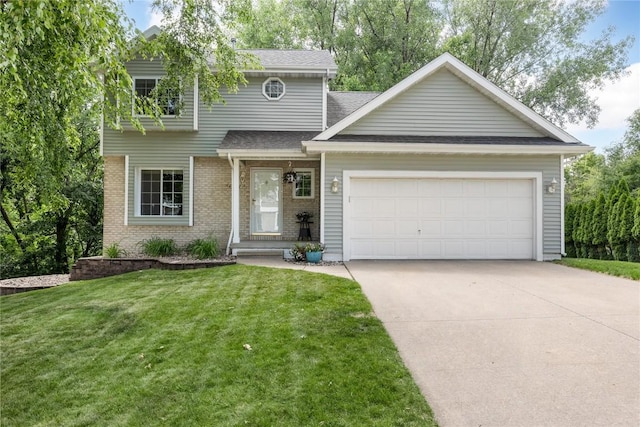 4127 Harwood Dr NE, Cedar Rapids, IA 52411 - traditional home featuring brick siding, a garage, concrete driveway, a front lawn, and a shingled roof