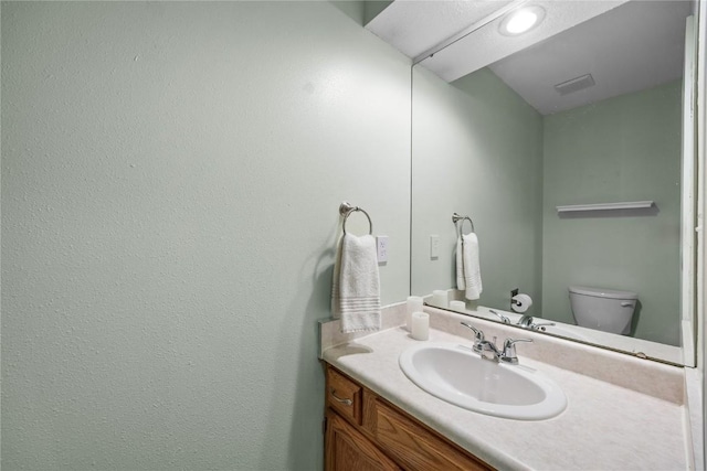 4127 Harwood Dr NE, Cedar Rapids, IA 52411 - bathroom featuring vanity and toilet