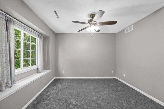 4127 Harwood Dr NE, Cedar Rapids, IA 52411 - carpeted empty room featuring a ceiling fan and a textured ceiling