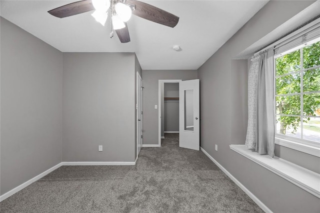 4127 Harwood Dr NE, Cedar Rapids, IA 52411 - empty room with carpet and ceiling fan