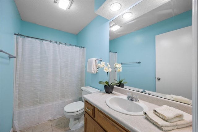 4127 Harwood Dr NE, Cedar Rapids, IA 52411 - full bathroom featuring vanity, tile patterned floors, shower / tub combo, and a textured ceiling