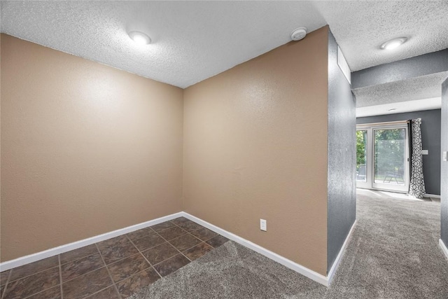 4127 Harwood Dr NE, Cedar Rapids, IA 52411 - empty room with a textured ceiling, a smoke detector, and a textured wall