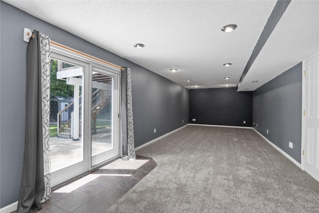 4127 Harwood Dr NE, Cedar Rapids, IA 52411 - carpeted spare room with a textured ceiling