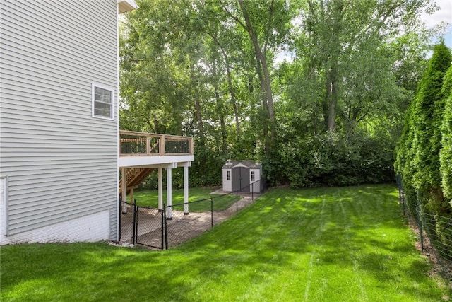 4127 Harwood Dr NE, Cedar Rapids, IA 52411 - view of yard featuring a storage shed and a wooden deck