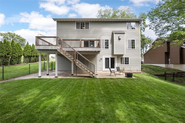 4127 Harwood Dr NE, Cedar Rapids, IA 52411 - back of house featuring a wooden deck, a patio, stairway, and a fire pit