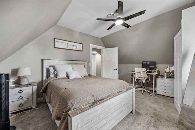 518 Main St, Fairfax, IA 52228 - carpeted bedroom featuring vaulted ceiling and ceiling fan