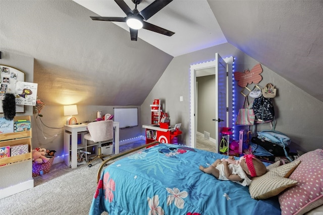 518 Main St, Fairfax, IA 52228 - bedroom featuring carpet floors, vaulted ceiling, a textured ceiling, and ceiling fan