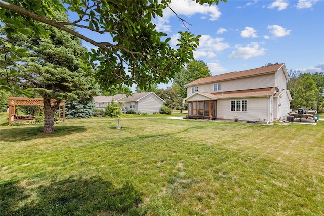 1865 Rock Island Dr, Ely, IA 52227 - view of grassy yard with a sunroom