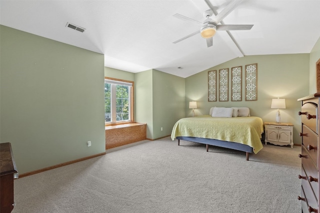 1865 Rock Island Dr, Ely, IA 52227 - carpeted bedroom with vaulted ceiling and ceiling fan
