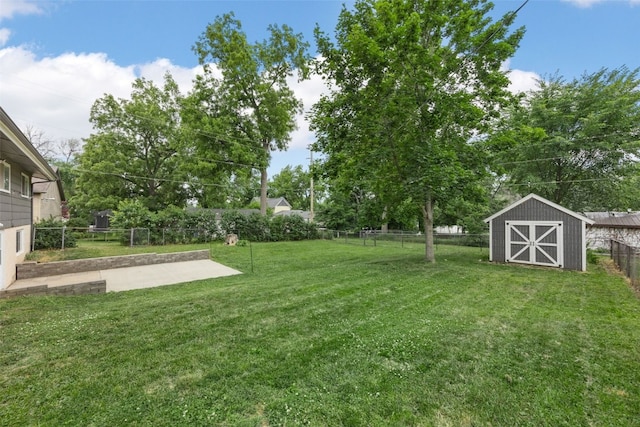 212 4th St SW, Mount Vernon, IA 52314 - fenced backyard featuring a storage shed and a patio