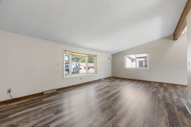 212 4th St SW, Mount Vernon, IA 52314 - unfurnished room with plenty of natural light, dark wood-style floors, and a textured ceiling