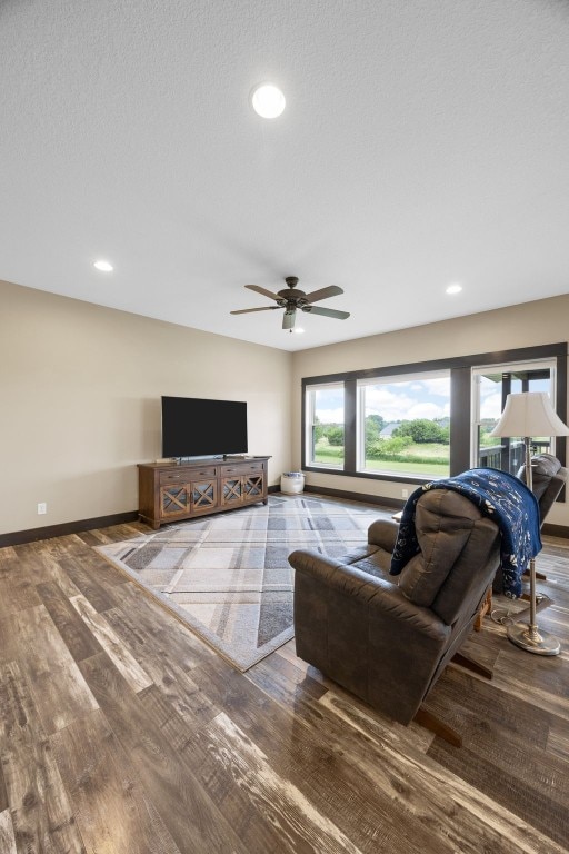 3363 Southridge Dr, Amana, IA 52203 - living area with a ceiling fan, wood finished floors, and recessed lighting