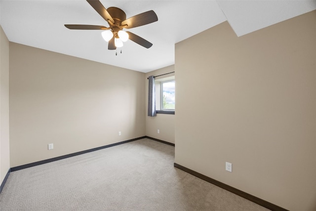 3363 Southridge Dr, Amana, IA 52203 - unfurnished room featuring a ceiling fan and light carpet