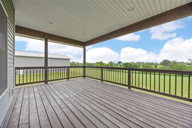 3363 Southridge Dr, Amana, IA 52203 - wooden deck with a lawn