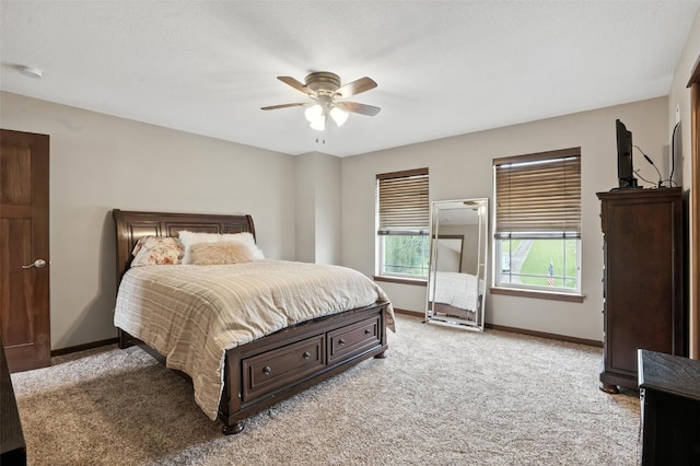 1102 S St, Urbana, IA 52345 - bedroom featuring light carpet and ceiling fan