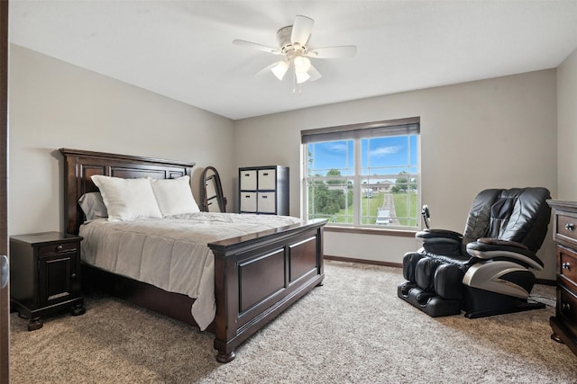 1102 S St, Urbana, IA 52345 - bedroom featuring light colored carpet and a ceiling fan
