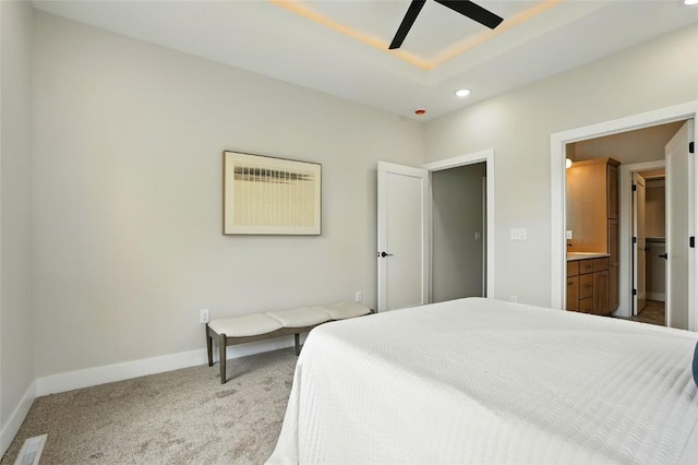 1002 Croell Ave, Tiffin, IA 52340 - carpeted bedroom featuring recessed lighting, ceiling fan, and ensuite bathroom