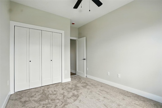 1002 Croell Ave, Tiffin, IA 52340 - unfurnished bedroom featuring carpet flooring, a closet, and a ceiling fan