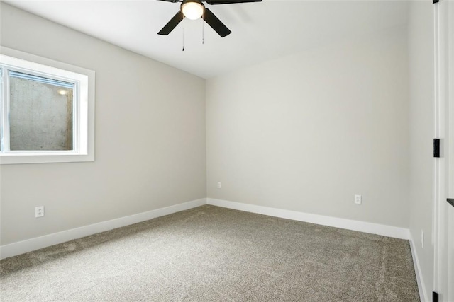 1002 Croell Ave, Tiffin, IA 52340 - carpeted empty room featuring ceiling fan and baseboards