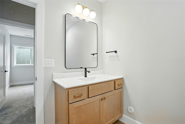 1002 Croell Ave, Tiffin, IA 52340 - bathroom featuring vanity and baseboards