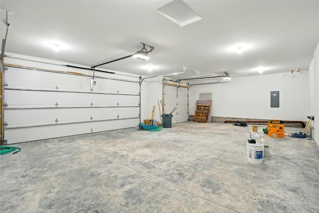 1002 Croell Ave, Tiffin, IA 52340 - garage featuring electric panel and a garage door opener