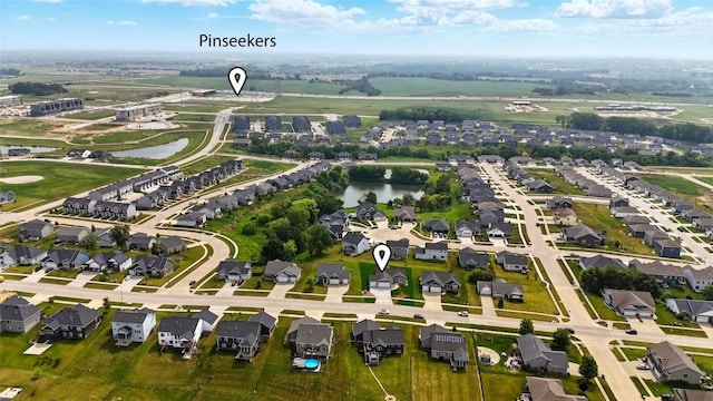 1002 Croell Ave, Tiffin, IA 52340 - aerial view of residential area with a nearby body of water