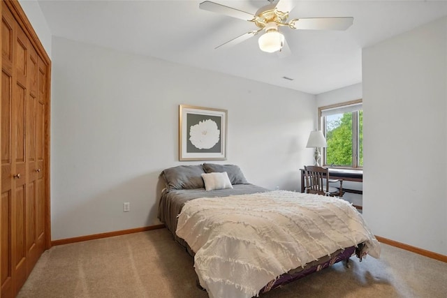 4317 Indian Tl NE, Solon, IA 52333 - bedroom with a closet, light colored carpet, and ceiling fan