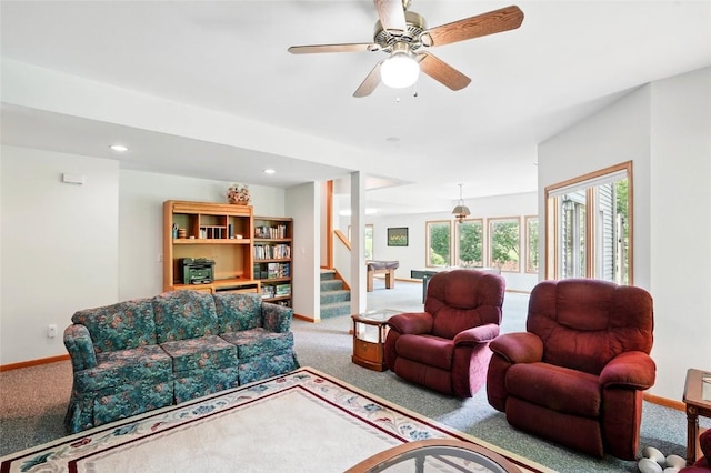 4317 Indian Tl NE, Solon, IA 52333 - living area with carpet, stairway, recessed lighting, and ceiling fan