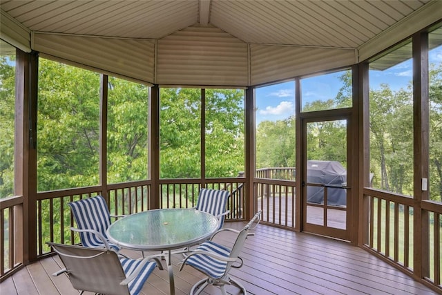4317 Indian Tl NE, Solon, IA 52333 - sunroom featuring vaulted ceiling and outdoor dining space
