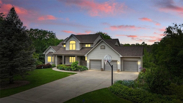 4317 Indian Tl NE, Solon, IA 52333 - traditional-style home with driveway, a garage, a front yard, and a shingled roof