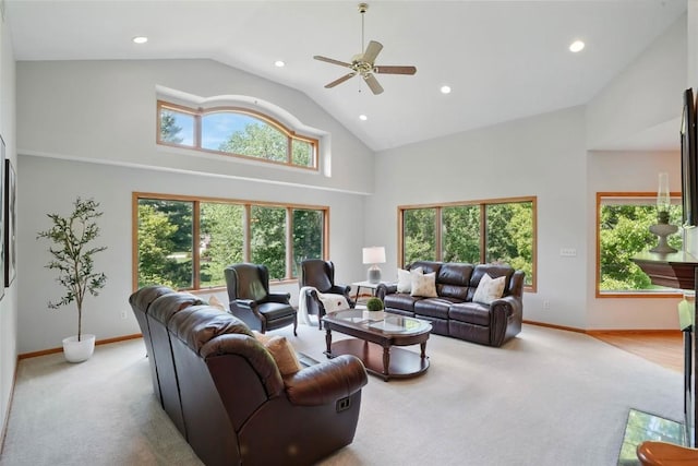 4317 Indian Tl NE, Solon, IA 52333 - living area featuring high vaulted ceiling, carpet floors, recessed lighting, healthy amount of natural light, and a ceiling fan