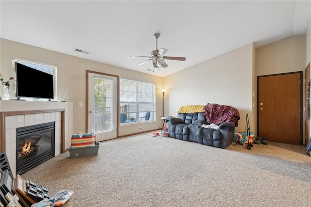 1230 Murray NE Unit 10, Cedar Rapids, IA 52402 - living room featuring carpet flooring, ceiling fan, and a fireplace