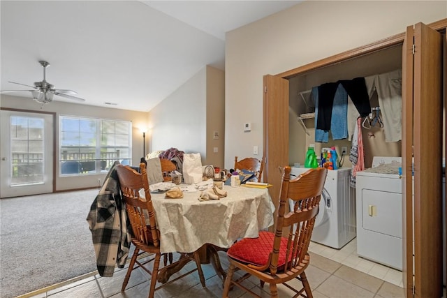 1230 Murray NE Unit 10, Cedar Rapids, IA 52402 - dining space with washer and dryer, a ceiling fan, and light tile patterned flooring