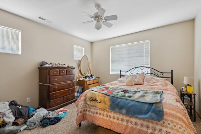 1230 Murray NE Unit 10, Cedar Rapids, IA 52402 - carpeted bedroom with ceiling fan