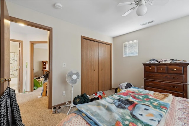 1230 Murray NE Unit 10, Cedar Rapids, IA 52402 - carpeted bedroom featuring a closet and a ceiling fan