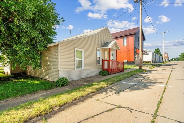 316 E Washington St, Center Point, IA 52213 - view of home's exterior with brick siding