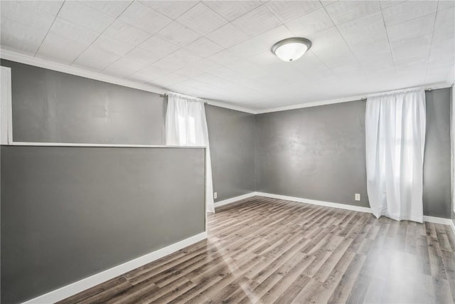 316 E Washington St, Center Point, IA 52213 - below grade area with ornamental molding and wood finished floors